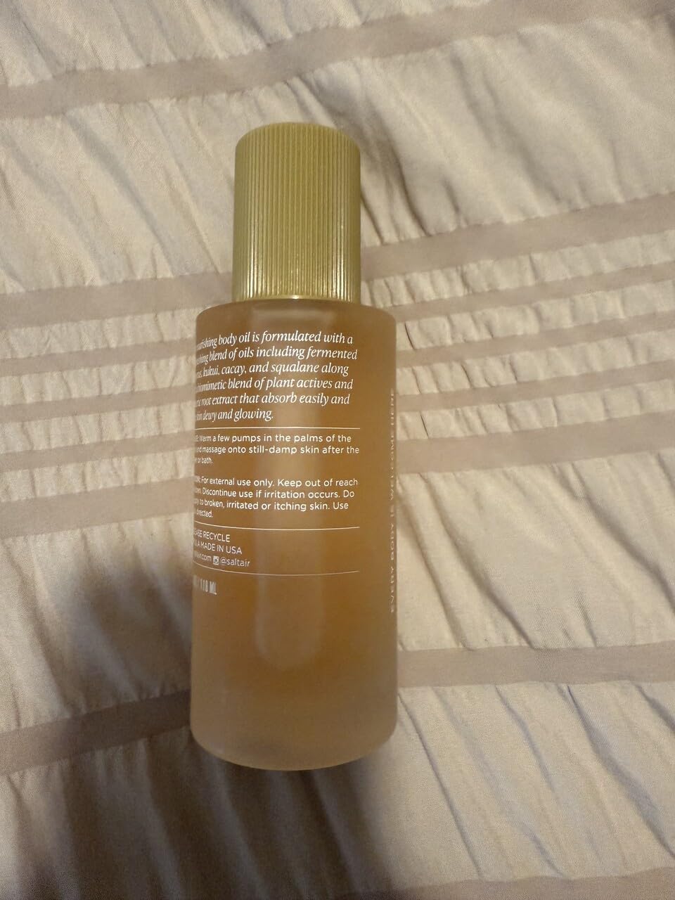 Saltair Body Oil on damp skin melts in for lasting moisture.