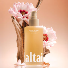 Close-up of Saltair body oil massaged into skin showing fast-absorbing moisture.