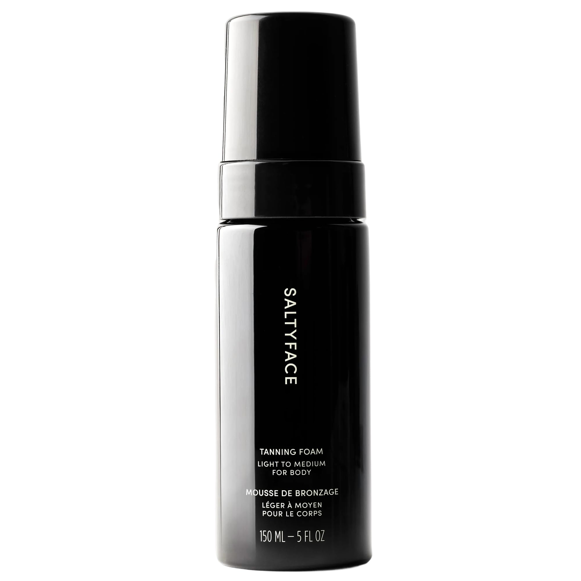 SALTYFACE tanning foam bottle front; vegan self-tanner for an even, natural-looking glow.
