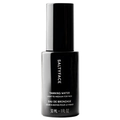SALTYFACE Tanning Water bottle and mist for a gradual, natural glow.