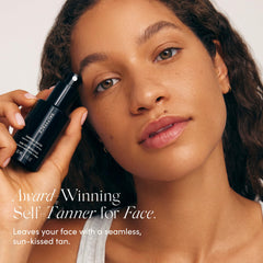 SALTYFACE tanning water fine mist for effortless even coverage.