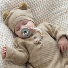 SAMiGO pacifier clip clasp close-up shows sturdy grip without fabric damage.