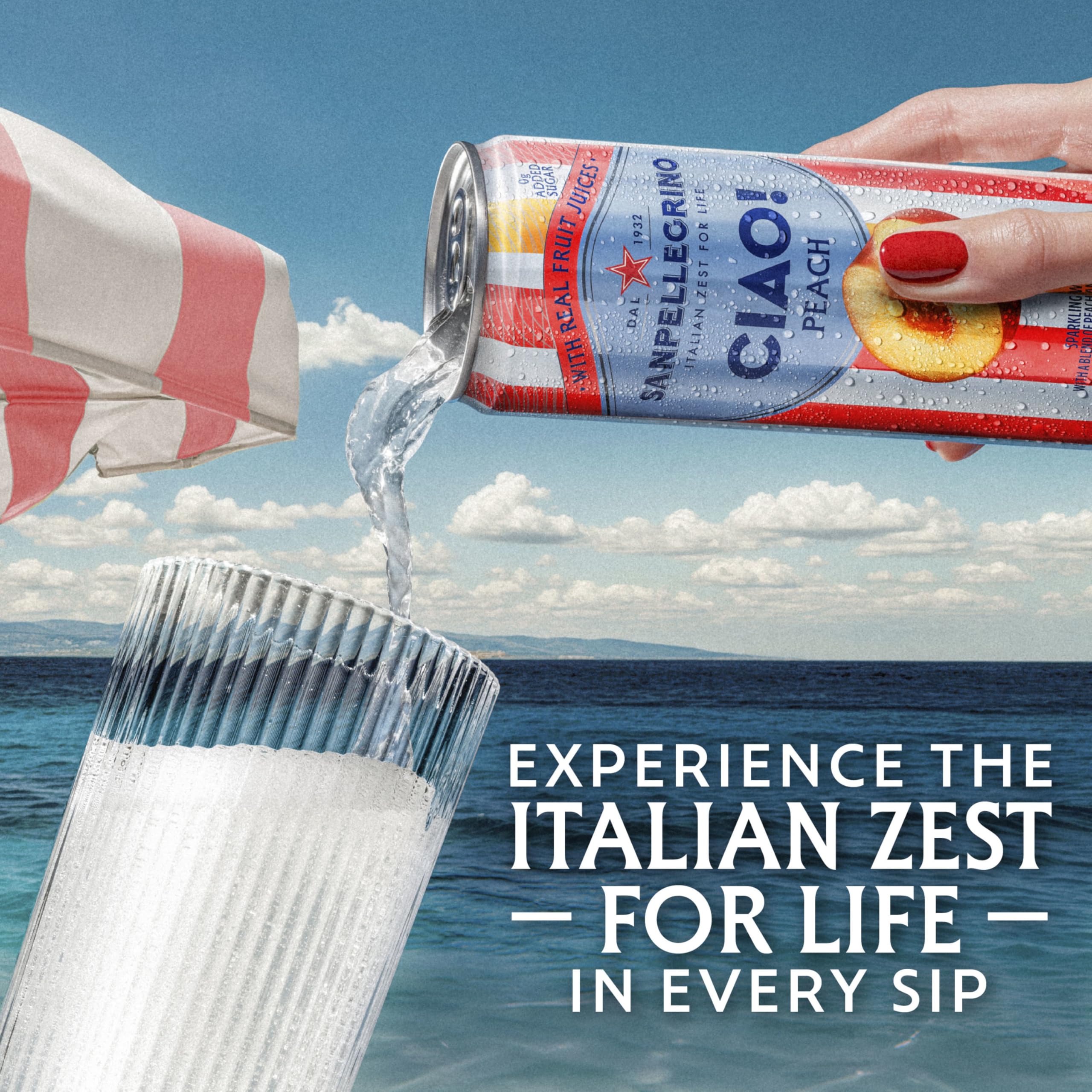 Bubbly San Pellegrino CIAO peach in a glass showing lively fizz.