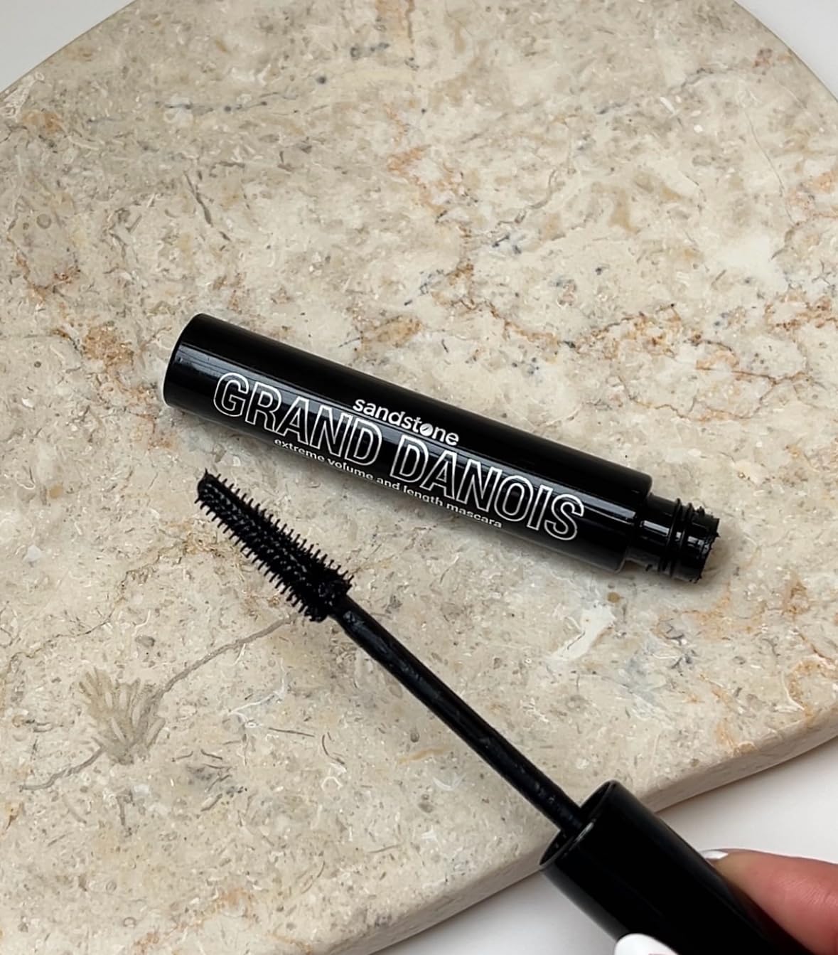 Vegan cruelty-free label on Sandstone Scandinavia mascara packaging.