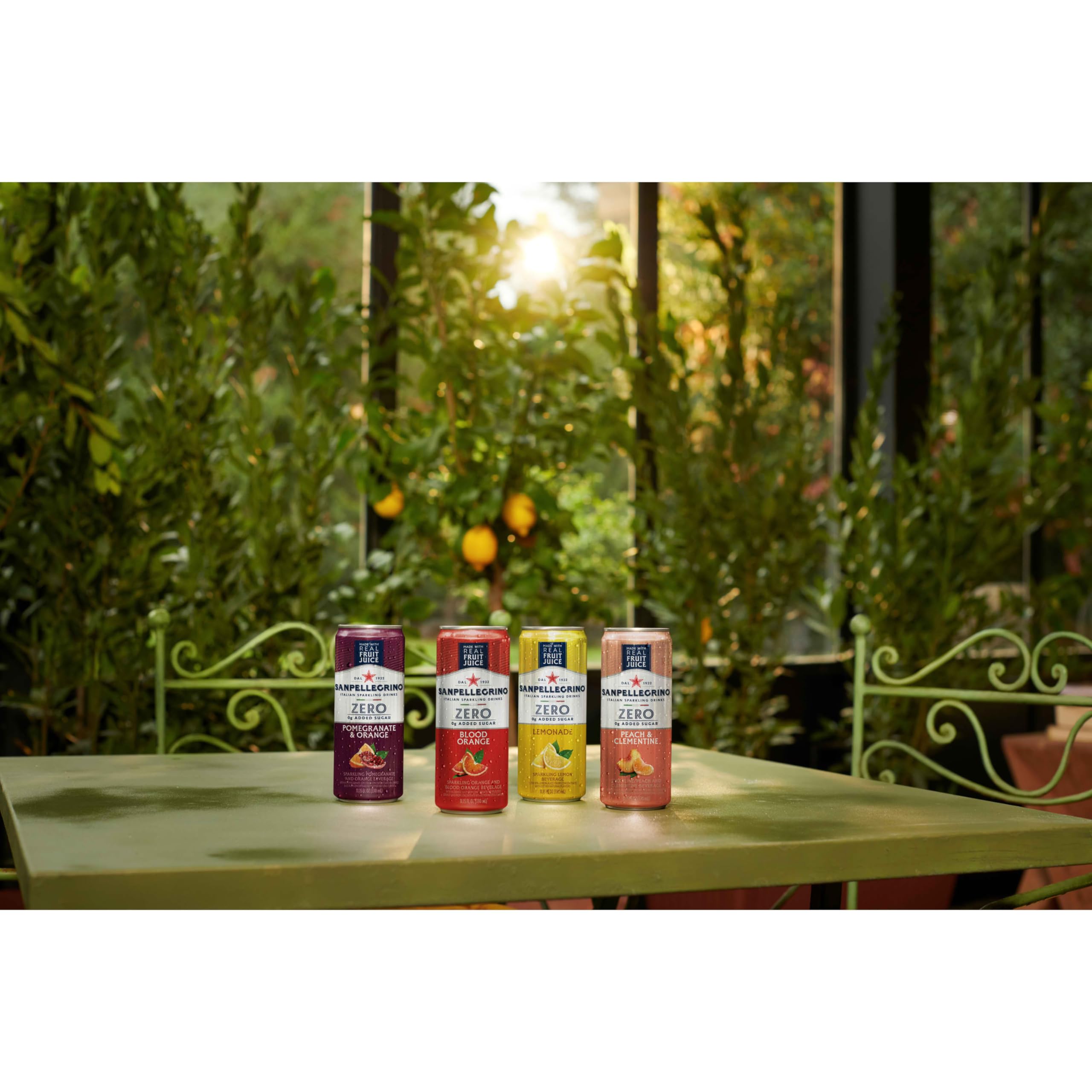 Sanpellegrino Zero Sugar Pomegranate-Orange with bubbles, perfect for a refreshing break.