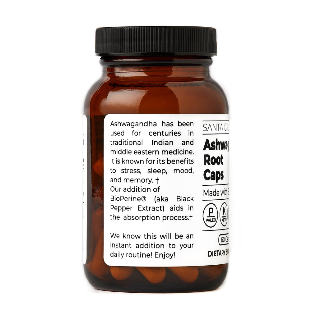 Santa Cruz Paleo capsules in hand suggesting a simple daily habit.
