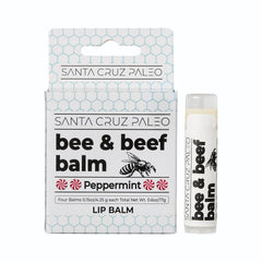 Santa Cruz Paleo peppermint lip balm being applied to lips.