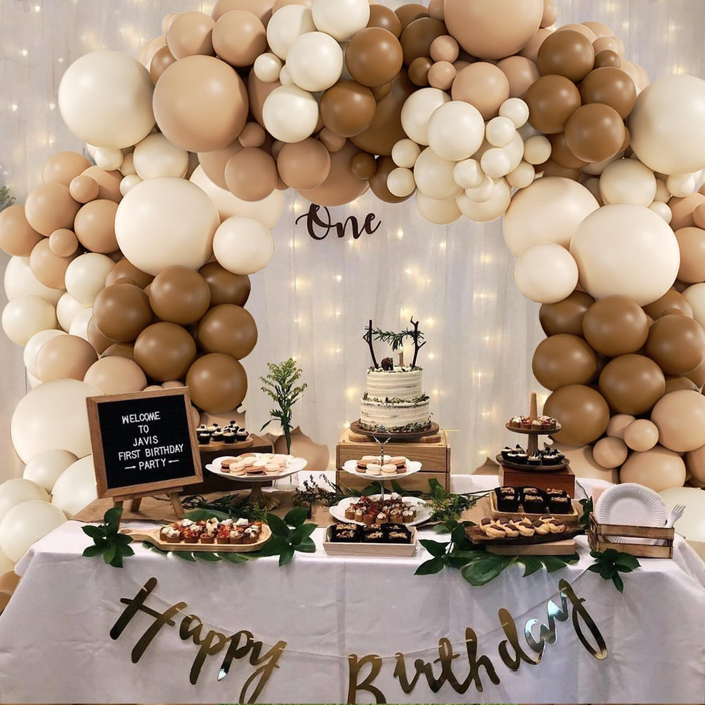 Saratimtou baby shower backdrop idea with neutral balloons.
