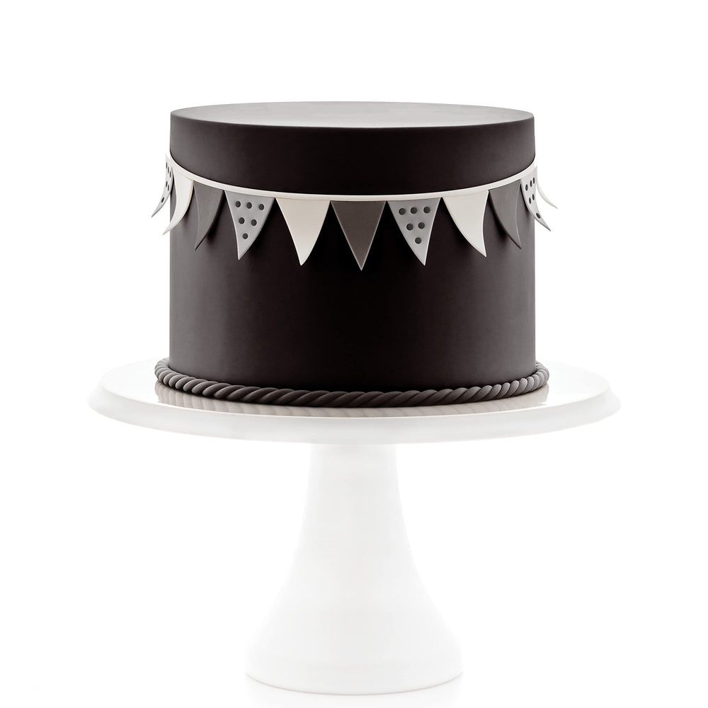 Satin Ice Black Fondant cut out shapes for custom cake decorations.