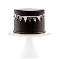 Satin Ice Black Fondant cut out shapes for custom cake decorations.