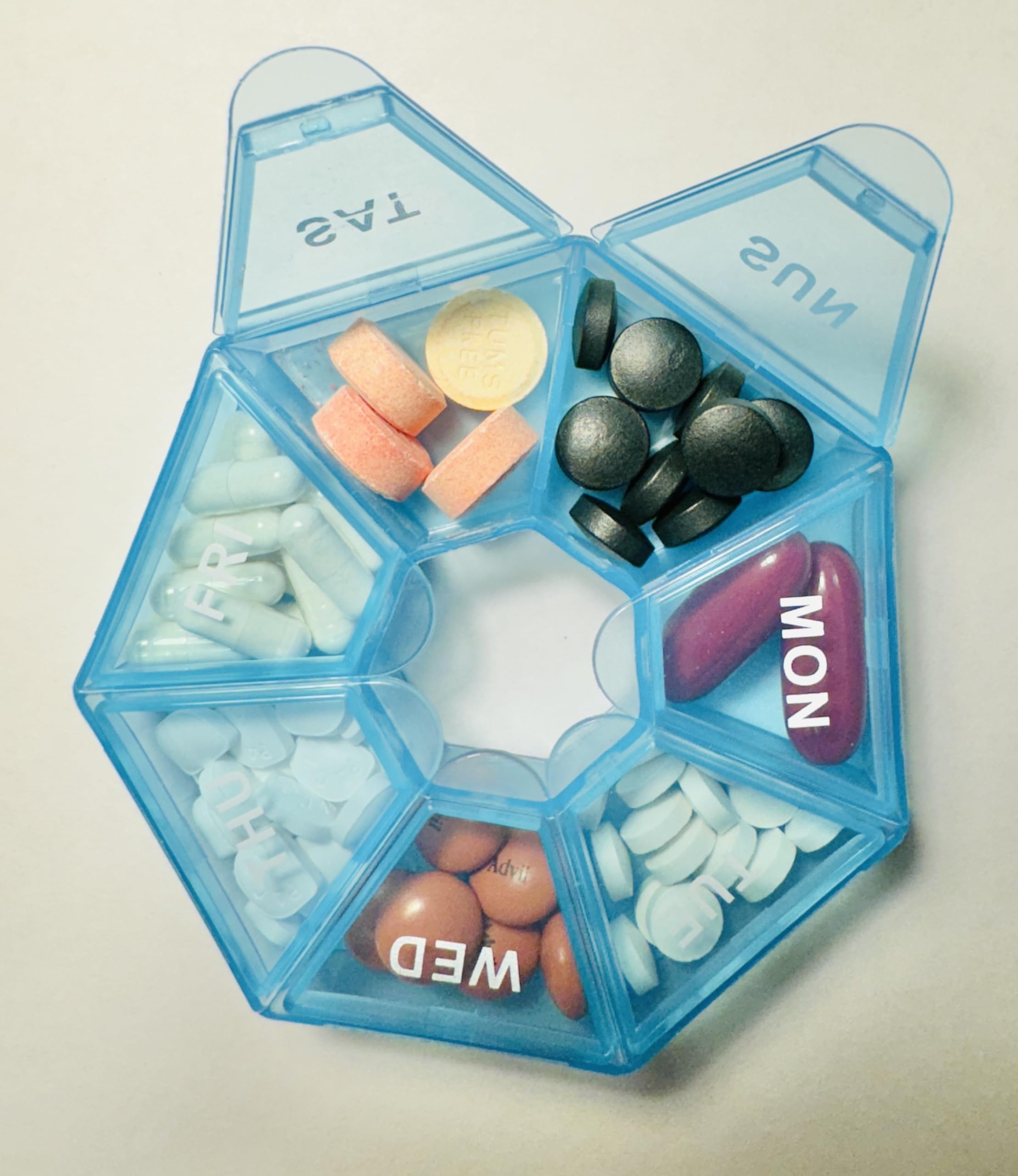 Bundle with weekly organizer beside Saw Palmetto softgels for consistency