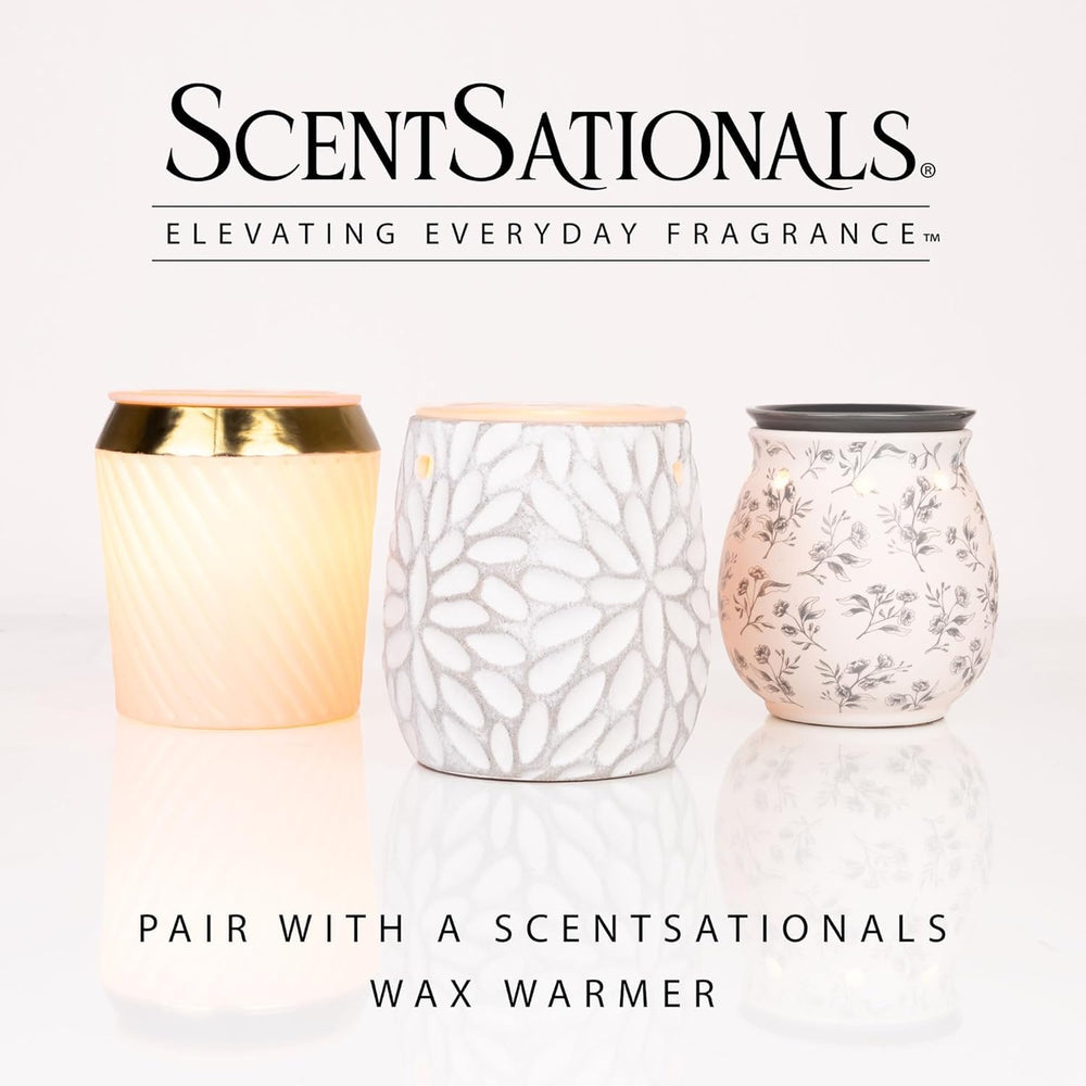 Fragrance splash showing vibrant orange hue and citrus notes