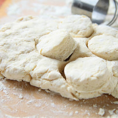 Scotty’s Everyday biscuits baking in the oven with a golden top.
