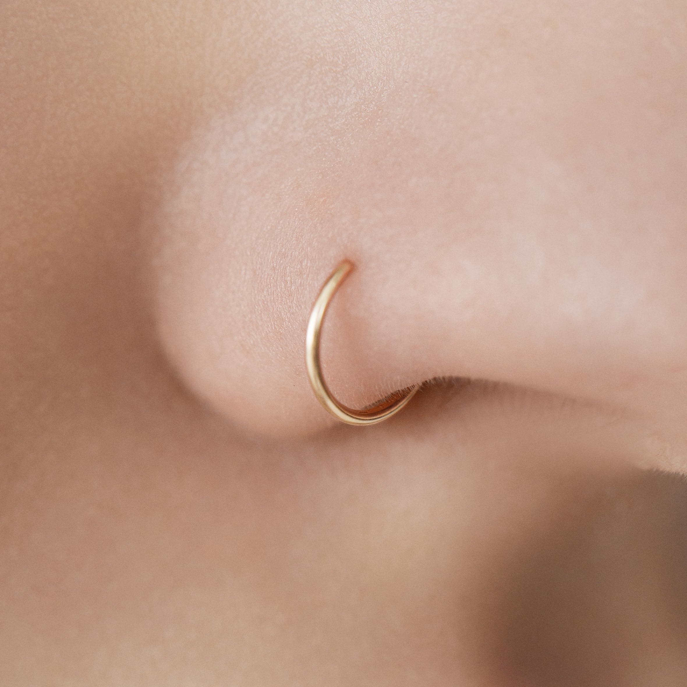 Sealoy gold clip-on nose ring adds warm glow to outfits