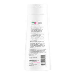 SEBAMED Everyday Shampoo foam lather showing a mild cleansing moment.