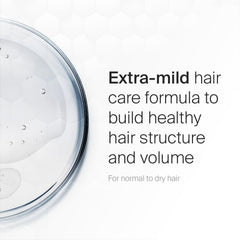 SEBAMED Everyday Shampoo on hair showing soft texture and shine.
