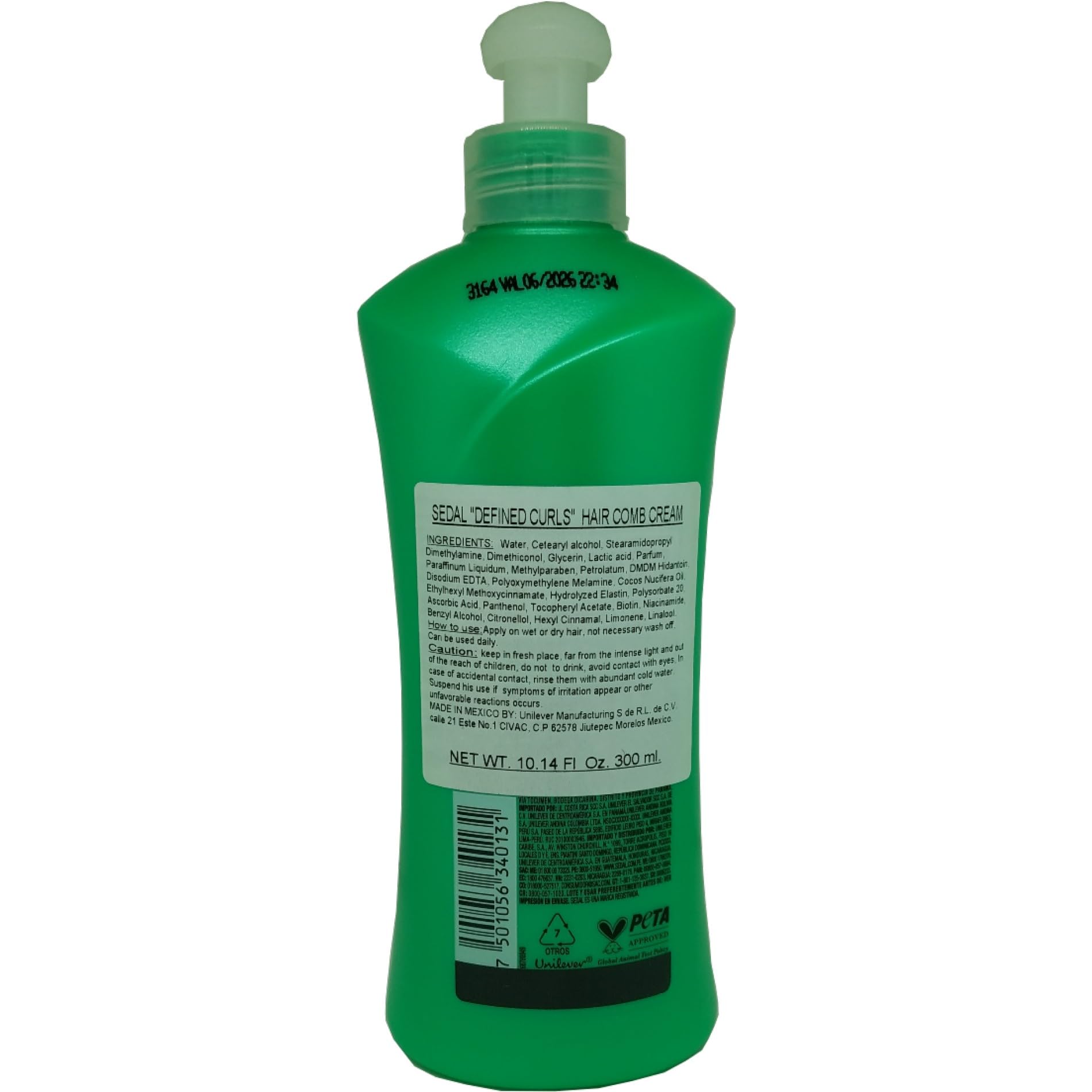 Applying Sedal Defined Curls Cream to enhance curls.
