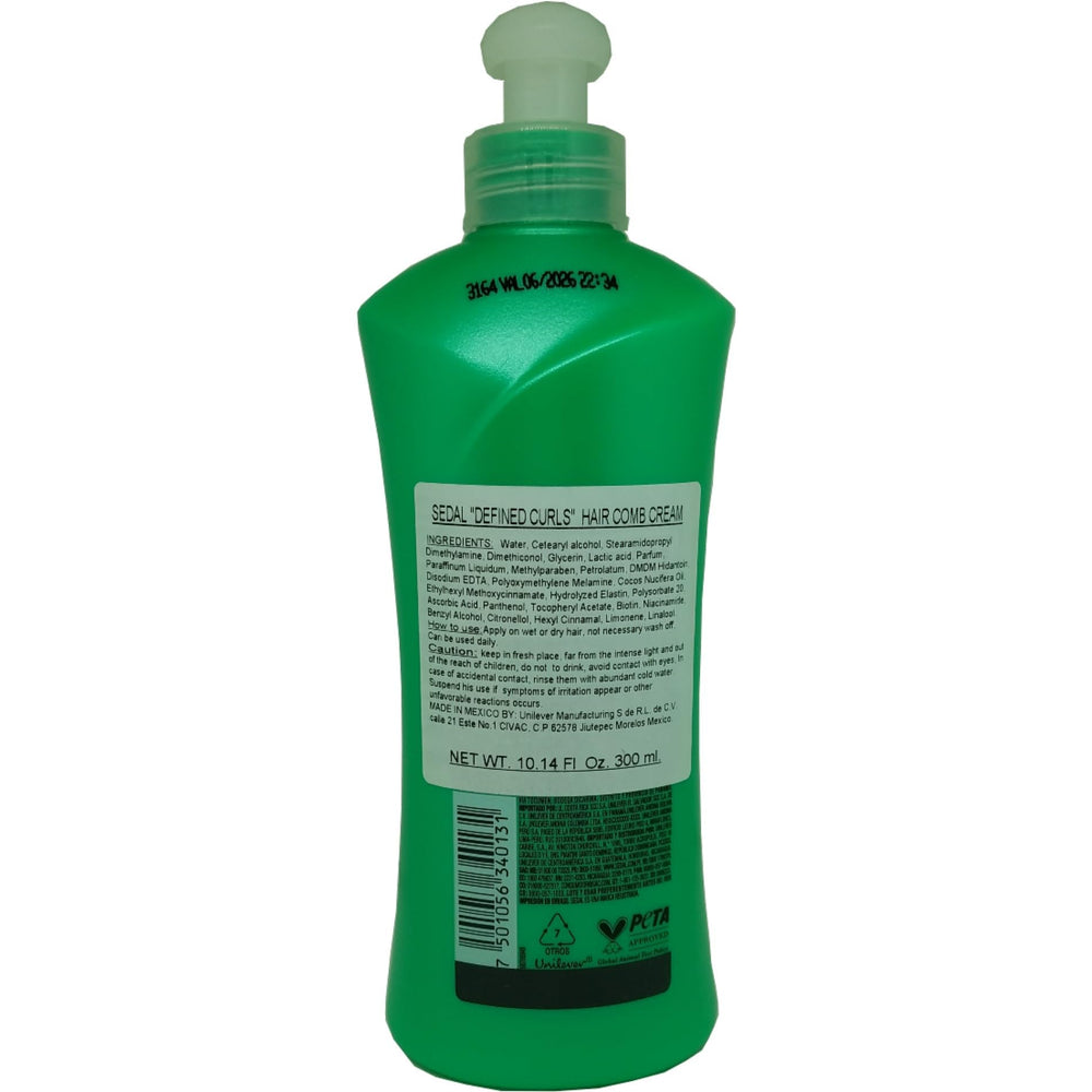 Applying Sedal Defined Curls Cream to enhance curls.