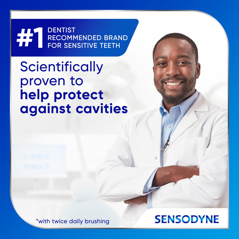 Close-up brushing with Sensodyne showing smooth paste application.