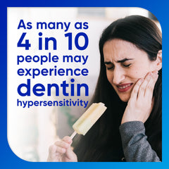 Close-up brushing Sensodyne Cool Mint for fresh breath and sensitivity relief.