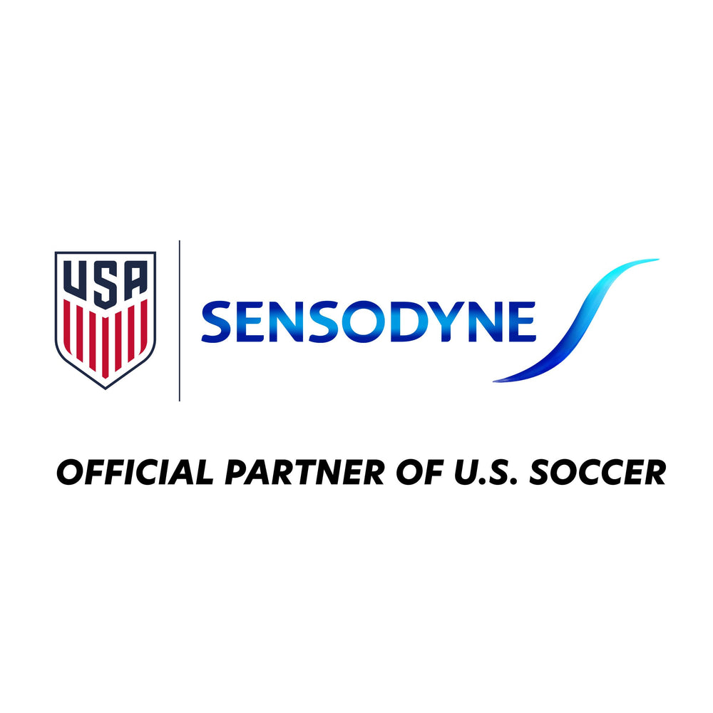Sensodyne Repair and Protect Whitening tubes stacked in four-pack display.