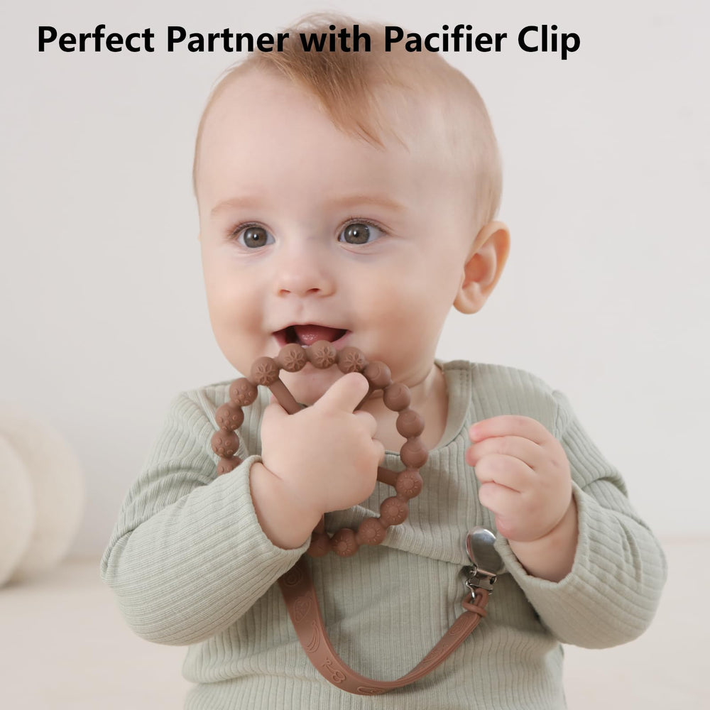Seposeve ring teether dot texture offers varied bristles for multi-sensory chewing