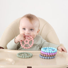 Seposeve teether demonstrates gum-massage textures for teething relief.