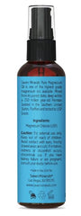 Seven Minerals magnesium oil spray in action, highlighting easy spray application.