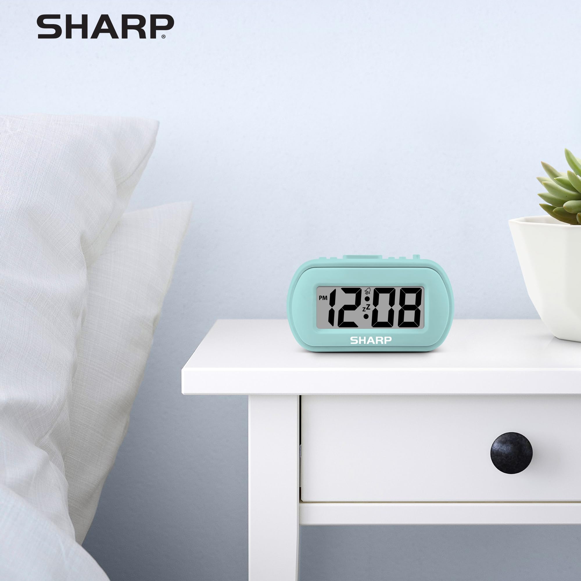 Sharp digital alarm clock portable bedside device for cord-free use