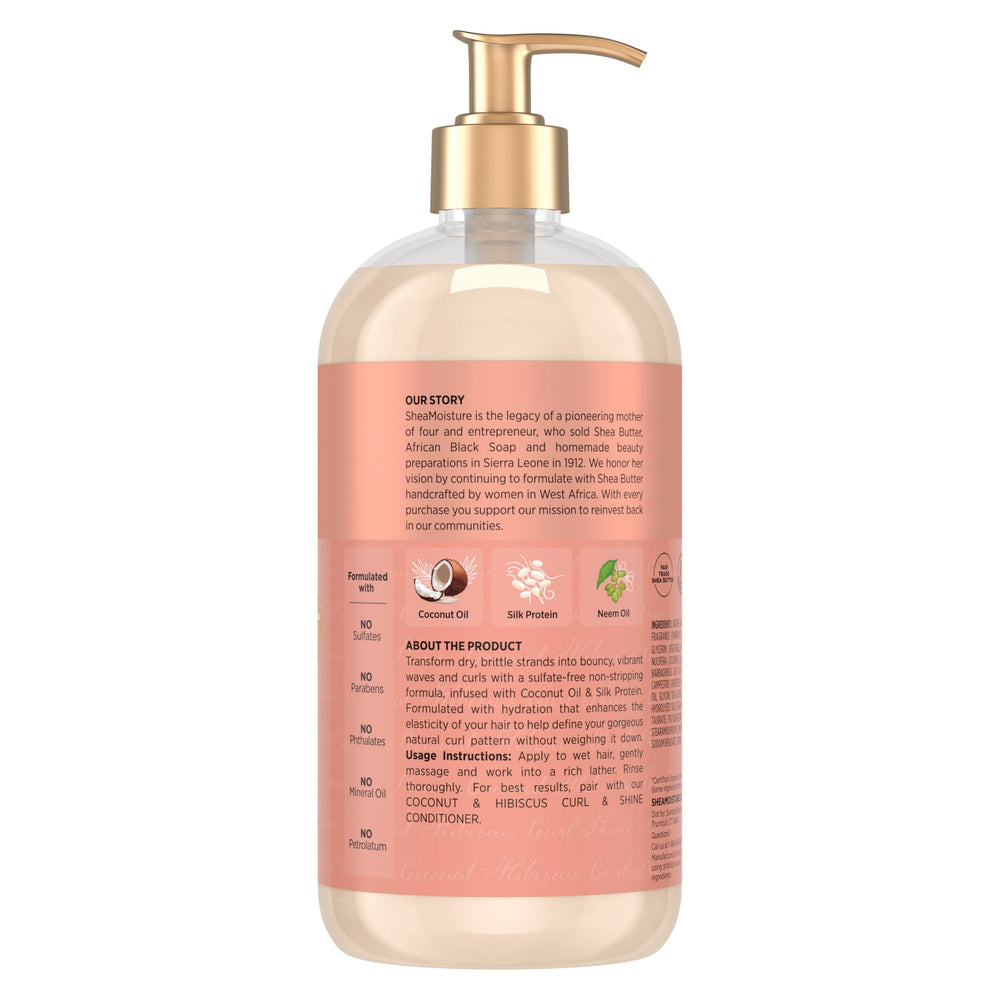 SheaMoisture Coconut Hibiscus Shampoo bottle pour showing rich lather