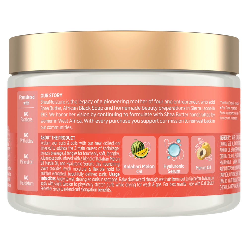 Applying Curl Stretch Volume Cream for smooth, defined curls.