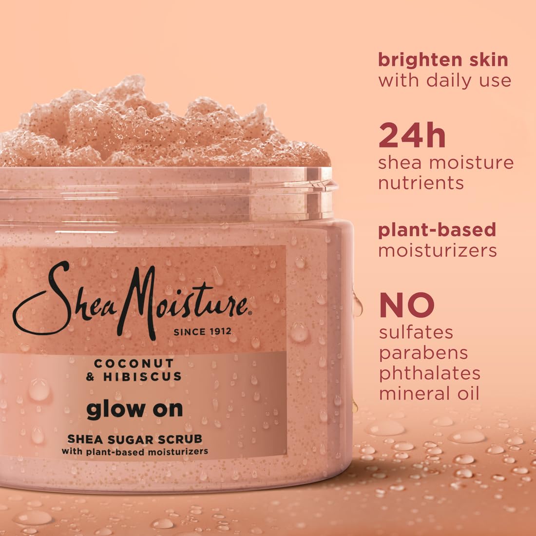 Close-up of Glowing Radiance Scrub texture highlighting creamy exfoliant particles.