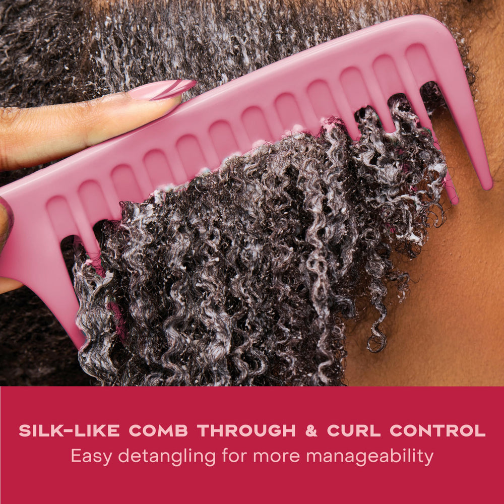 Hair looks shiny and smooth after use of SheaMoisture conditioner.