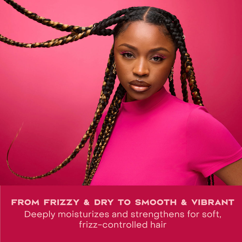 Wet-hair application demonstrates even coverage with SheaMoisture conditioner.