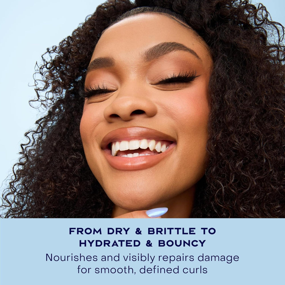 SheaMoisture Manuka Honey Yogurt Mousse on hair, defining waves with 24-hour humidity protection