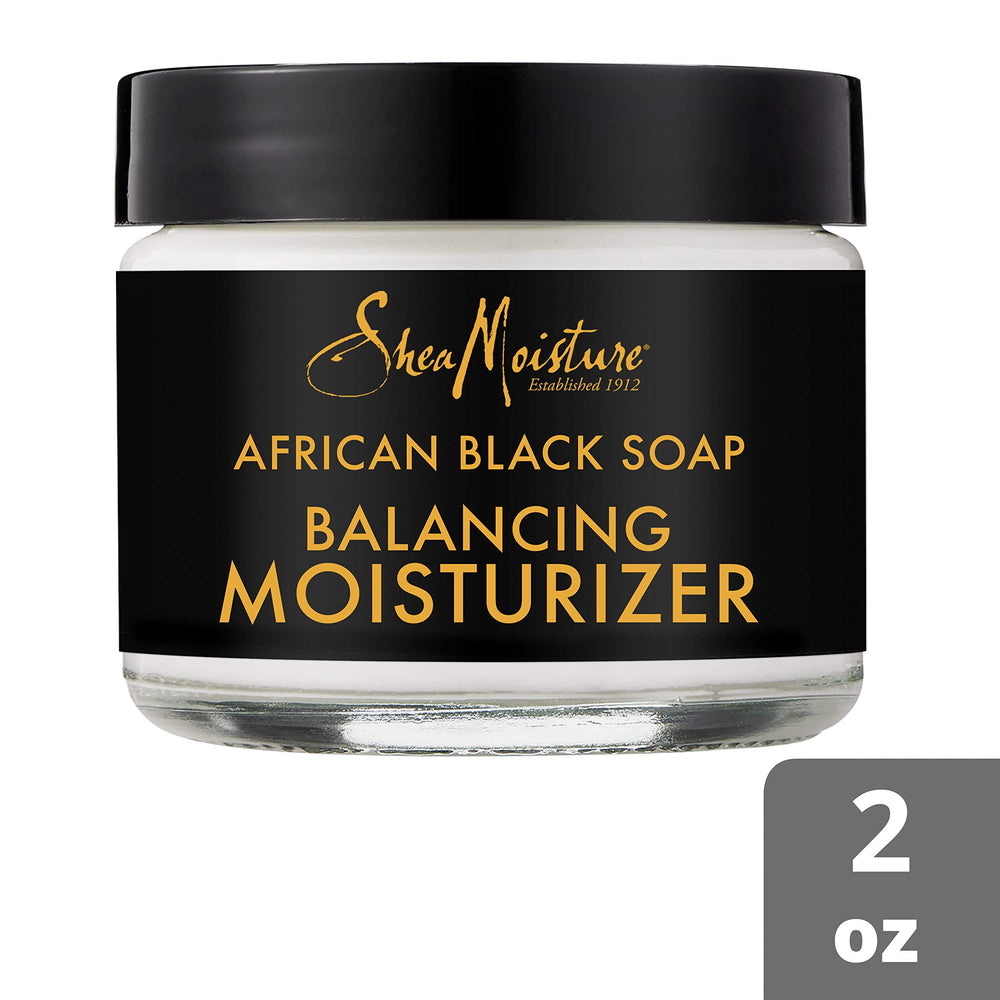Sheamoisture Fair-trade Shea Butter jar showcases ethically sourced ingredients for moisturizing.