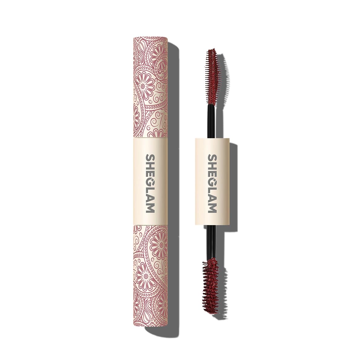 SHEGLAM All-In-One mascara burgundy bottle delivers bold color payoff for dramatic lashes.