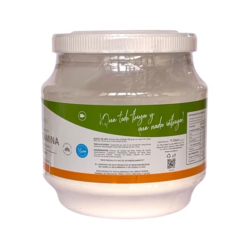 Sheló NABEL lemon collagen powder being mixed in a glass.