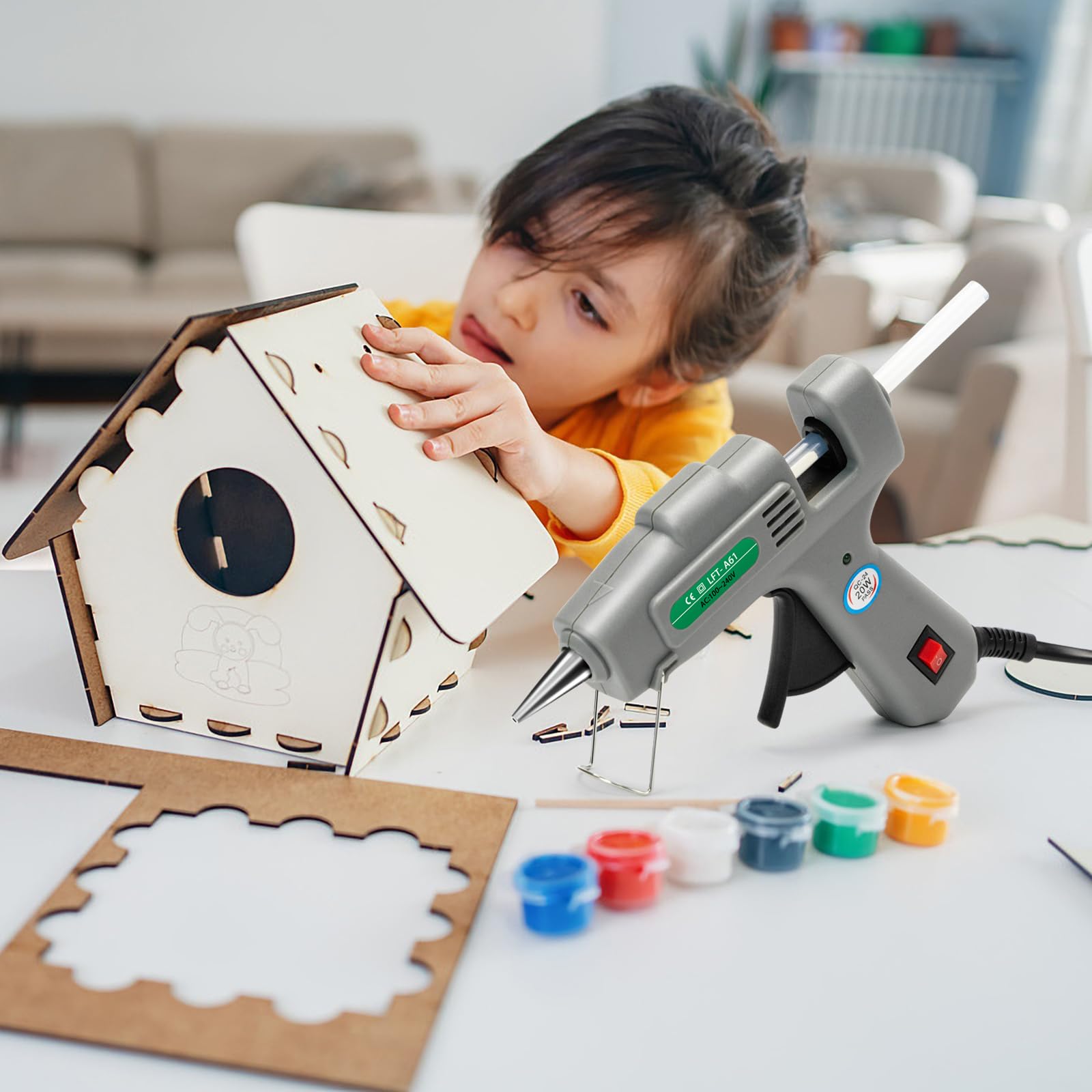 SHJADE glue gun in use with project showing steady application.