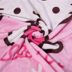 SIKYUCOR pink cartoon blanket on couch for relaxed lounging and warmth