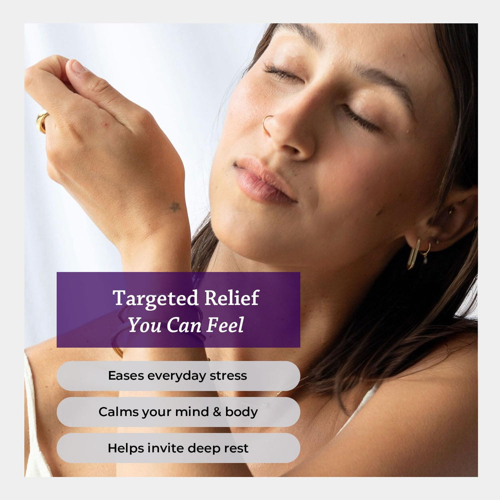 Mist on wrists with Silk Road Organic Lavender Spray for calm moments