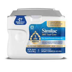 Similac 360 Total Care infant formula bottle with a smooth pour.