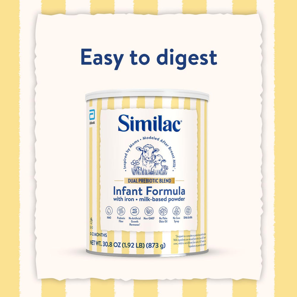 Baby smiling during feeding with Similac formula