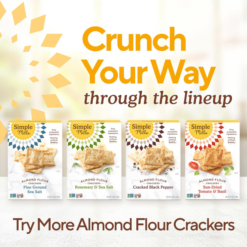 Party spread featuring Simple Mills cheddar crackers and cheese board.