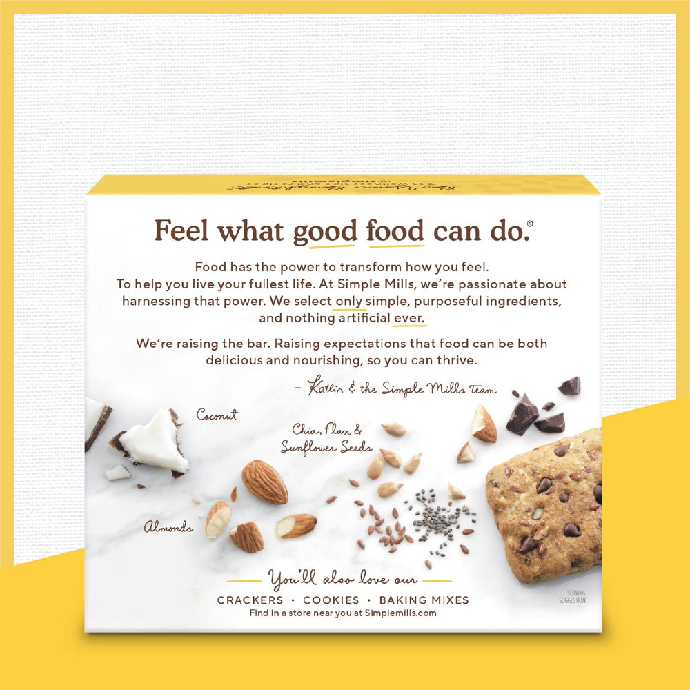 Unwrapped Simple Mills bar reveals soft-baked texture and chocolate chips.
