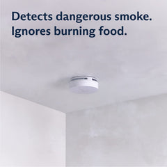 SimpliSafe detector burn-test illustrating false-alarm avoidance.