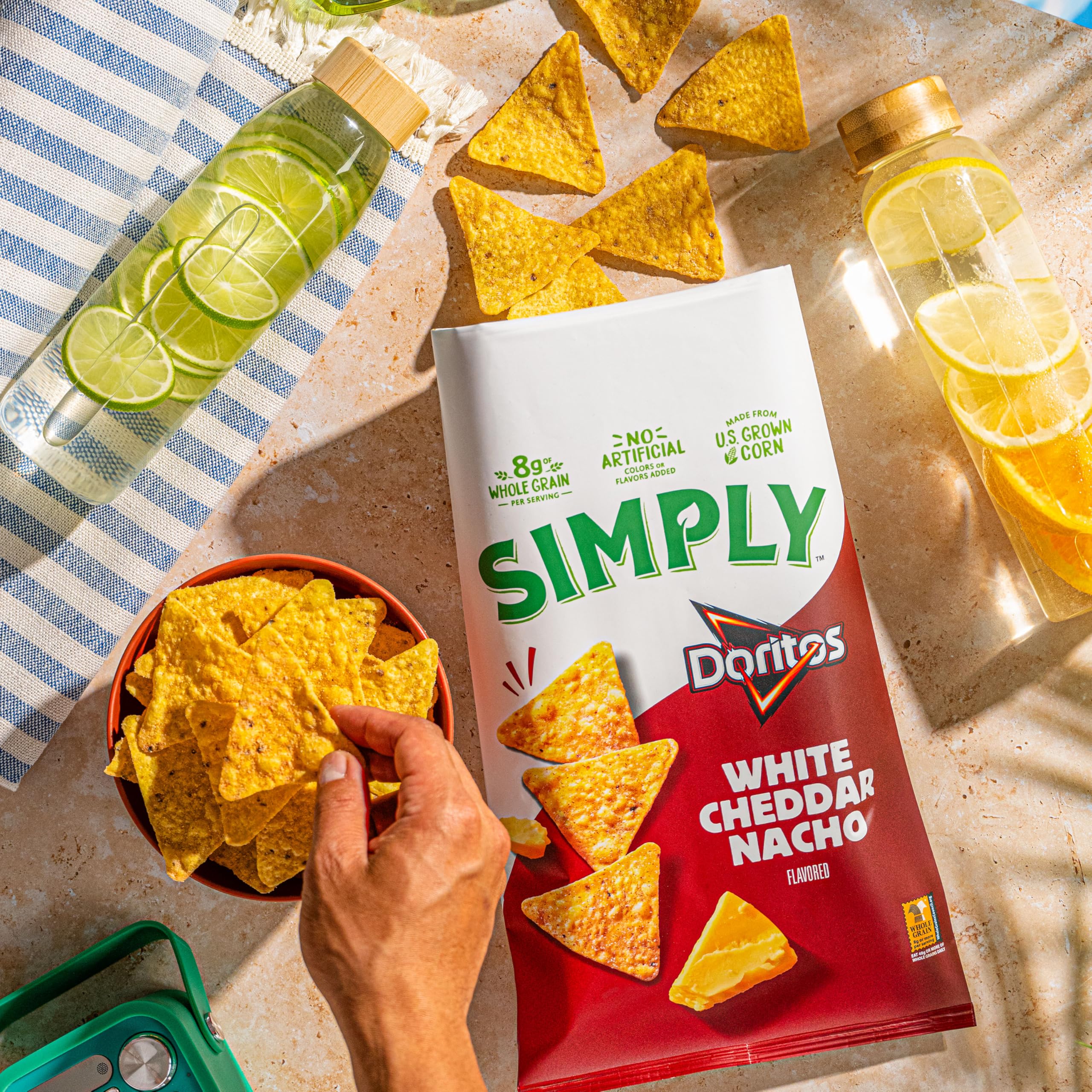 Simply family snack time scene with multiple bags on kitchen counter.