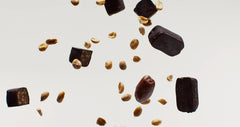 Chocolate-coated bar highlights fair trade chocolate and coconut sugar sweetness.