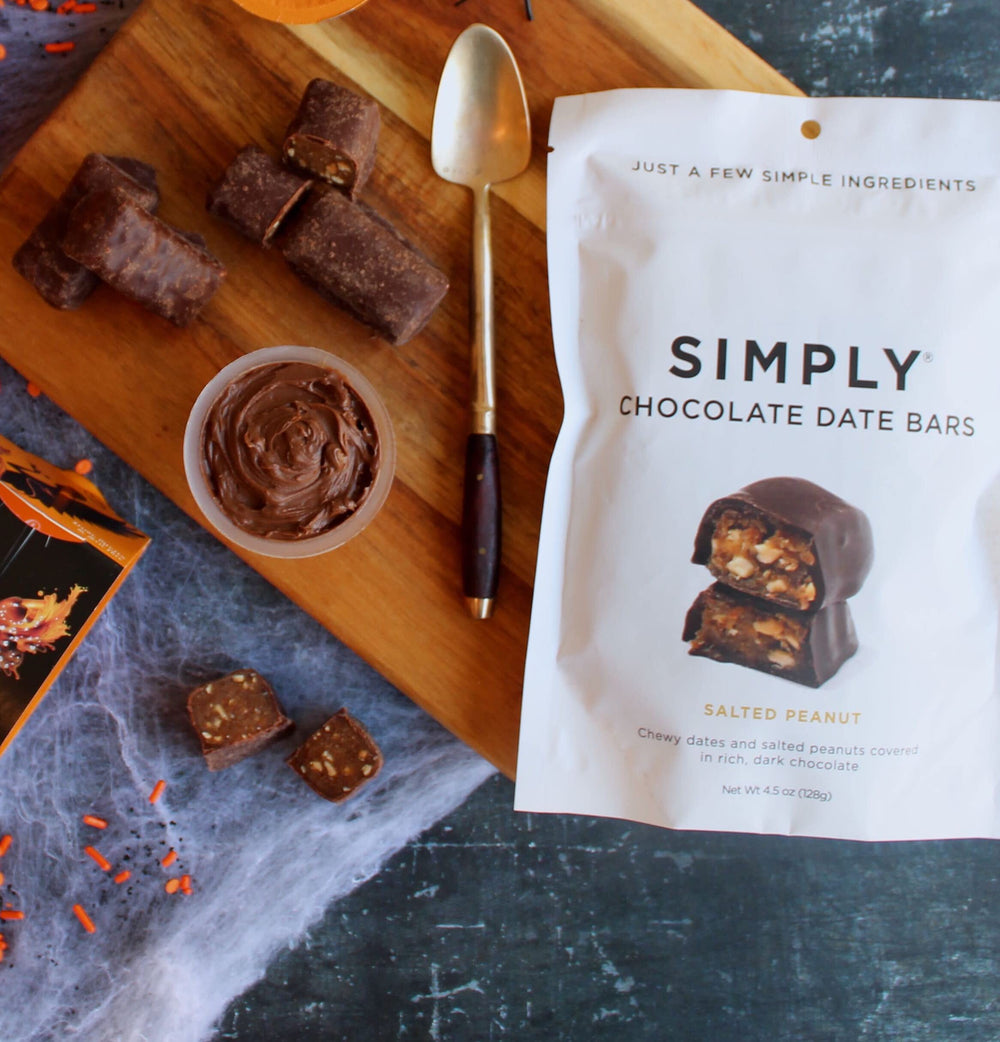 Cross-section shows gooey dates and peanut crunch in Simply Gum date bar.