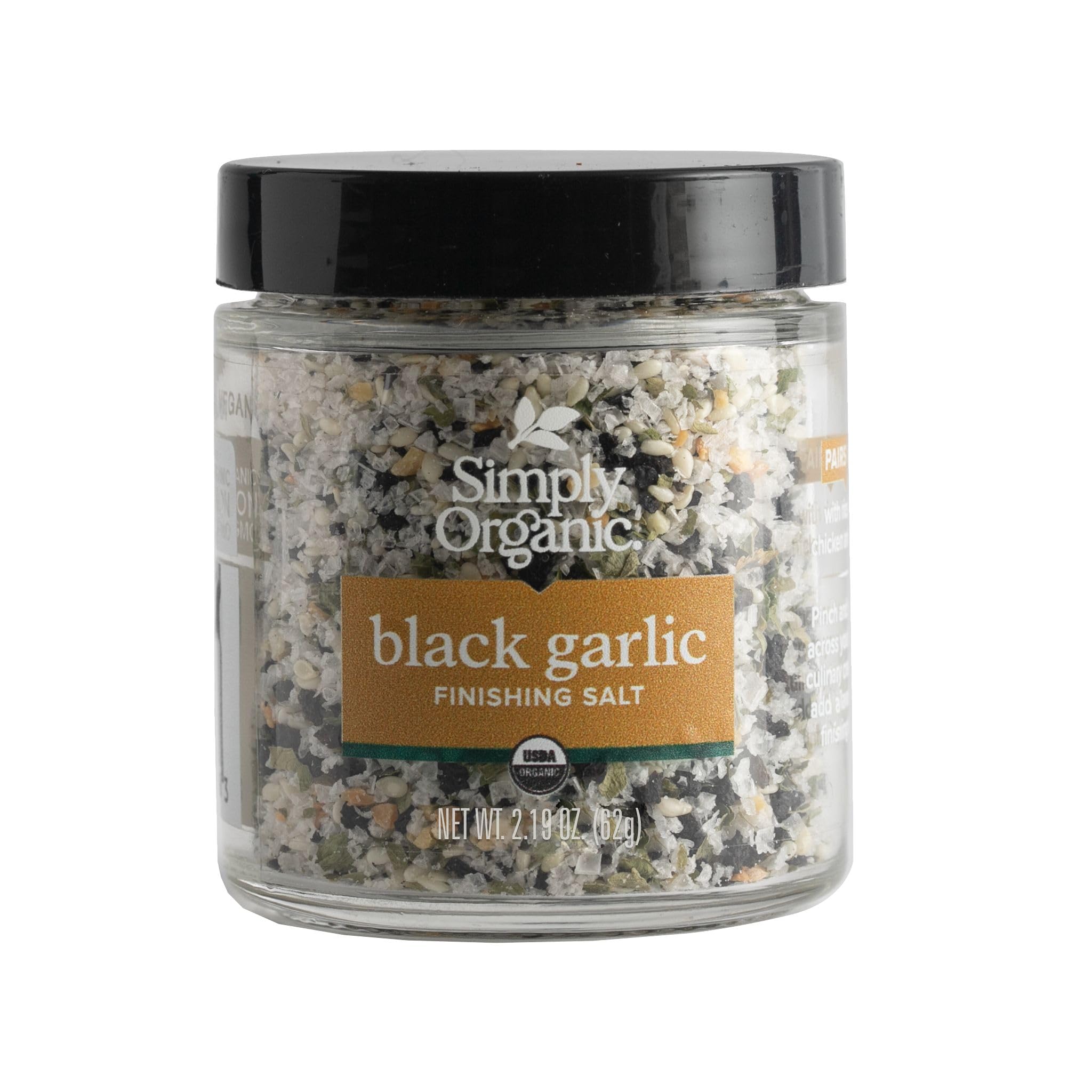 Simply Organic Black Garlic Finishing Salts jar close-up enhancing grilled meat with savory depth